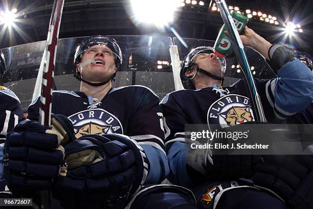 Kamil Kreps of the Florida Panthers and teammate David Booth wait on the bench for their next shift against the Boston Bruins at the BankAtlantic...