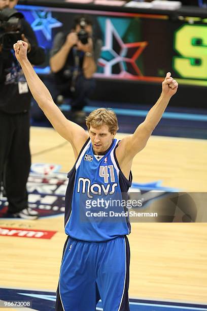 Dirk Nowitzki of Team Texas reacts after winning the Haier Shooting Stars Competition as part of All Star Saturday Night during 2010 NBA All Star...