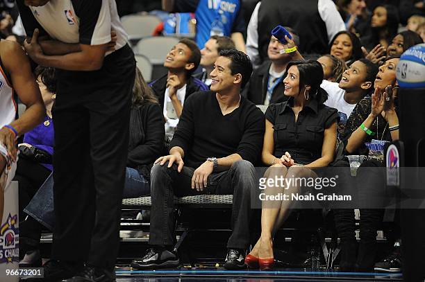 Personality Mario Lopez sits sideline during the Taco Bell Skills Challenge as part of All Star Saturday Night during 2010 NBA All Star Weekend on...