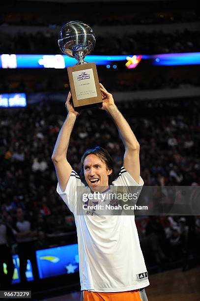 Steve Nash of the Phoenix Suns hoists his trophy as winner of the Taco Bell Skills Challenge as part of All Star Saturday Night during 2010 NBA All...