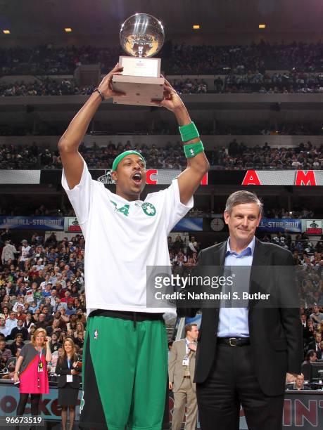 Paul Pierce of the Boston Celtics hoists his trophy after winning the Foot Locker Three Point Contest on All-Star Saturday Night as part of the 2010...