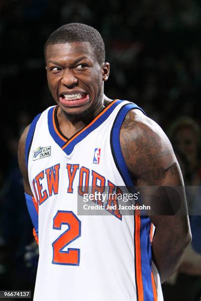 Nate Robinson of the New York Knicks reacts during the trophy presentation after his third win during the Sprite Slam Dunk Contest on All-Star...