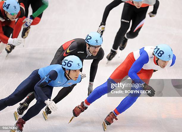 Pieter Gysel of Belgium and Apollo Anton Ohno from USA compete in the men's 1500 m heat at the Pacific Coliseum on February 13, 2010 during the 2010...