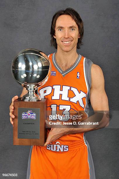 Taco Bell Skills Challenge winner Steve Nash of the Phoenix Suns poses with the trophy on All-Star Saturday Night, as part of 2010 NBA All-Star...