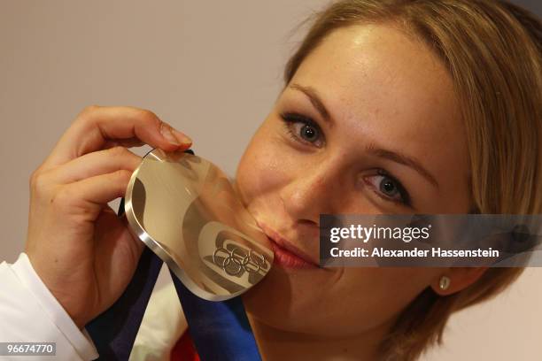 Magdalena Neuner of Germany, silver medalist in the Women's Biathlon 7.5 km Sprint on day 2 of the Vancouver 2010 Winter Olympics poses at the German...