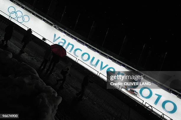 Germany's Felix Loch competes in the men's Luge Singles run at Whistler Sliding Center on February 13, 2010 during the Vancouver Winter Olympics. AFP...