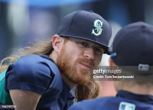 Ben Gamel of the Seattle Mariners talks to Ichiro Suzuki during batting practice before the start of MLB game action against the Toronto Blue Jays at...