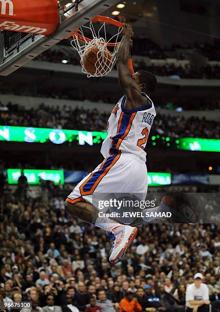 Nate Robinson of the New York Knicks slam dunks during the Sprite Slam Dunk Contest on All-Star Saturday Night, part of 2010 NBA All-Star Weekend, at...