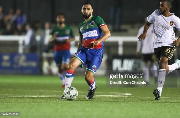 Aryan Tajbakhsh of Barawa passes the ball during the CONIFA World Football Cup 2018 match between Barawa and Tamil Eelam at Bromley on May 31, 2018...
