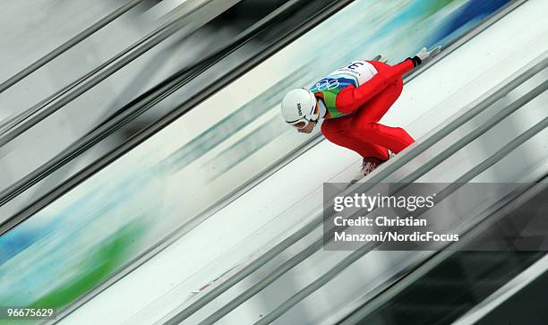 Martin Schmitt of Germany competes during the Ski Jumping Normal Hill Individual event on day 2 of the Olympic Winter Games Vancouver 2010 ski...