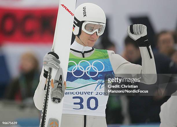 Martin Schmitt of Germany reacts after his final jump during the Ski Jumping Normal Hill Individual event on day 2 of the Olympic Winter Games...
