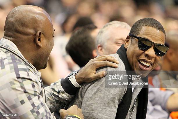 Producer/rapper Shawn "Jay-Z" Carter laughs during the Haier Shooting Stars Competition on All-Star Saturday Night, part of 2010 NBA All-Star Weekend...