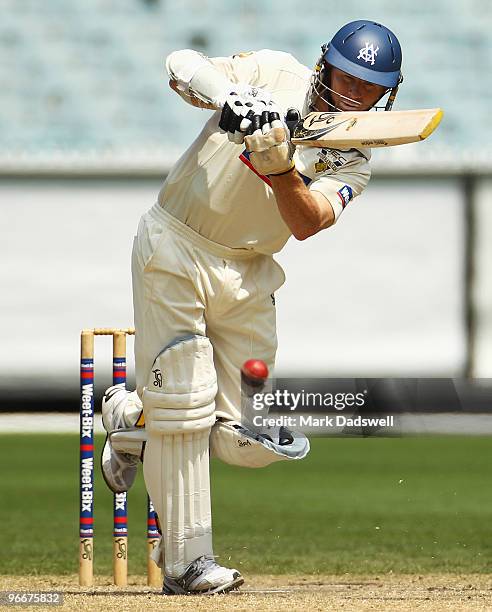 Chris Rogers of the Bushrangers straight drives during day three of the Sheffield Shield match between the Victorian Bushrangers and the Queensland...