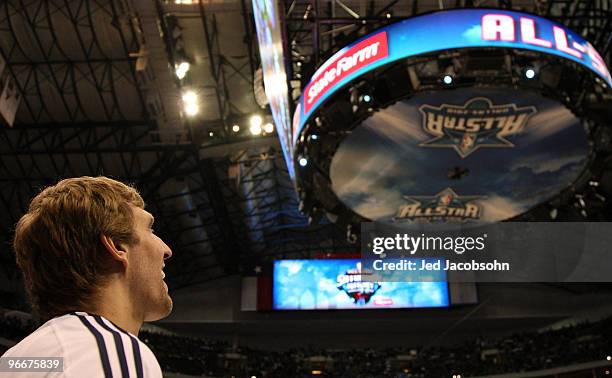 Dirk Nowitzki of the Dallas Mavericks looks on while playing for Team Texas during the Haier Shooting Stars Competition on All-Star Saturday Night,...