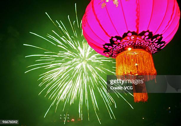 Fireworks explode to celebrate the Spring Festival on February 13, 2010 in Yichang, Hubei Province of China. Chinese people celebrate the lunar new...