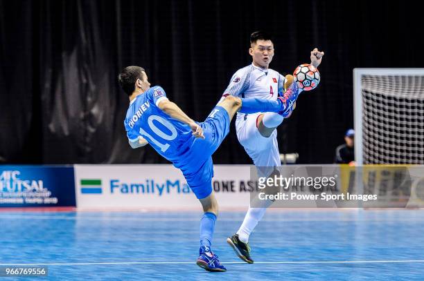 Choriev Davron of Uzbekistan fights for the ball with Co Tri Kiet of Vietnam during the AFC Futsal Championship Chinese Taipei 2018 Quarter Finals...