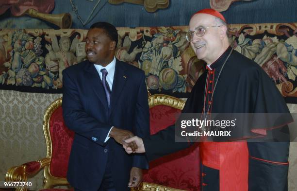 Togo's president Faure Gnassigbe and Vatican Secretary of State Tarcisio Bertone - Pope Benedict XVI met Togo's president Faure Gnassigbe at the...