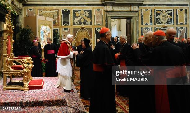 Pope Benedict XVI exchanges Christmas wishes with cardinals and prelates, in the Clementine Hall, at the Vatican.