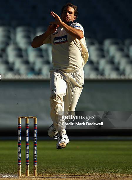 John Hastings of the Bushrangers bowls during day three of the Sheffield Shield match between the Victorian Bushrangers and the Queensland Bulls at...