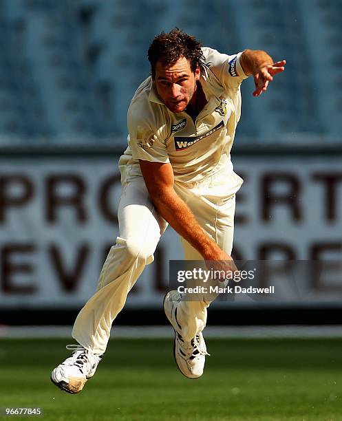 John Hastings of the Bushrangers bowls during day three of the Sheffield Shield match between the Victorian Bushrangers and the Queensland Bulls at...