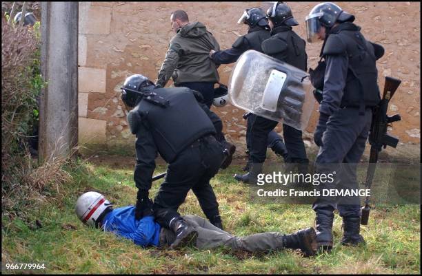 Simulated turn of events on hostile foreign territory. Italian and Spanish riot police are in charge of providing security for the arrival of a group...
