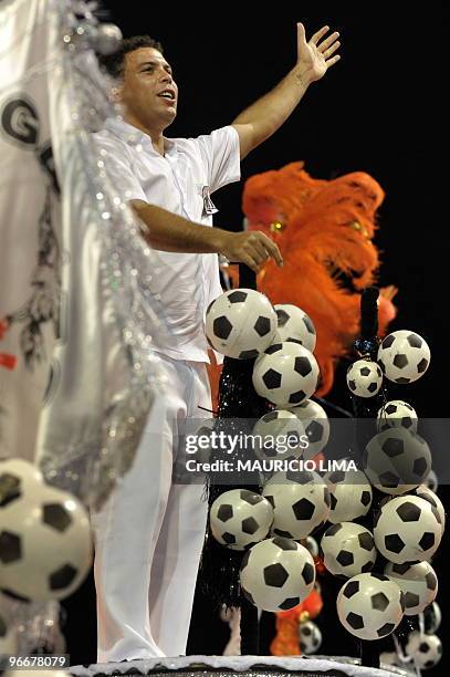 Brazilian soccer striker Ronaldo of the Corinthians football club parades atop of a float of the Gavioes da Fiel samba school at the Sambadrome, as...