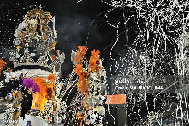 Brazilian soccer striker Ronaldo of the Corinthians football club parades atop of a float of the Gavioes da Fiel samba school at the Sambadrome, as...