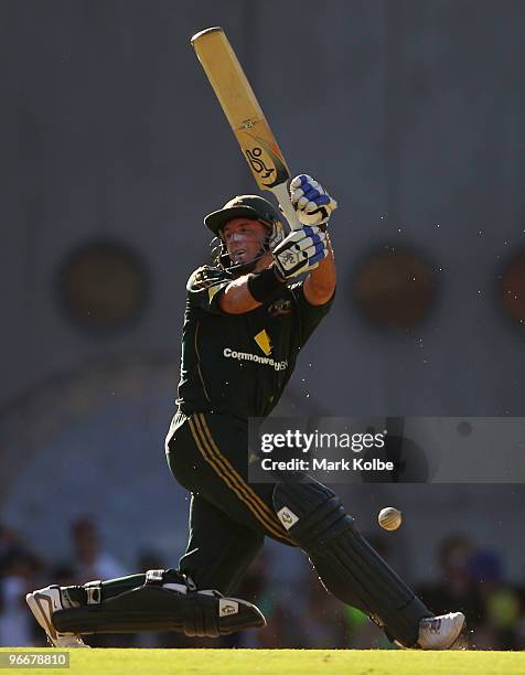 Michael Hussey of Australia hits out during the Fourth One Day International match between Australia and the West Indies at The Gabba on February 14,...