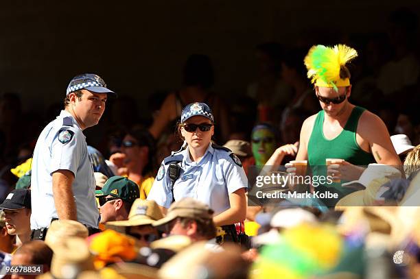 Police keep a close watch on the crowd during the Fourth One Day International match between Australia and the West Indies at The Gabba on February...