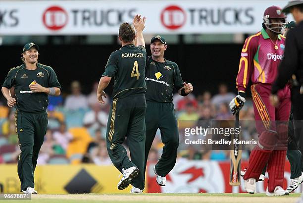 Doug Bollinger of Australia takes the wicket of Chris Gayle of the West Indies during the Fourth One Day International match between Australia and...