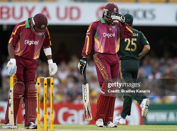 Chris Gayle of the West Indies puts his head down after he is dismissed off the bowling of Doug Bollinger of Australia during the Fourth One Day...