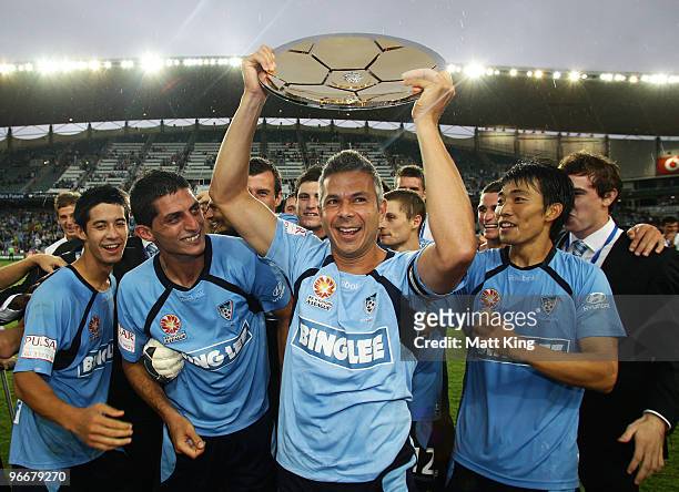 Sydney captain Steve Corica holds aloft the minor premiership trophy after the round 27 A-League match between Sydney FC and the Melbourne Victory at...