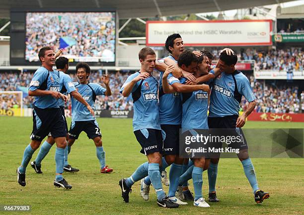 Karol Kisel of Sydney celebrates with team mates after scoring a first half goal during the round 27 A-League match between Sydney FC and the...