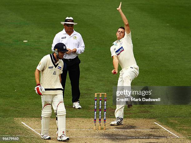 John Hazlewood of the Blues bowls during day three of the Sheffield Shield match between the Victorian Bushrangers and the Queensland Bulls at...