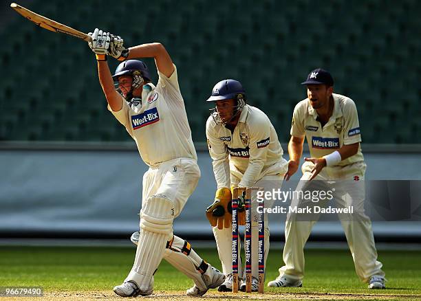Steven Smith of the Blues hits down the ground during day three of the Sheffield Shield match between the Victorian Bushrangers and the Queensland...