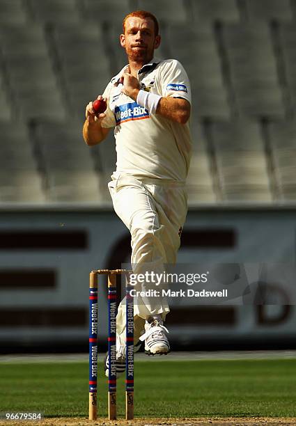 Andrew McDonald of the Bushrangers bowls during day three of the Sheffield Shield match between the Victorian Bushrangers and the Queensland Bulls at...