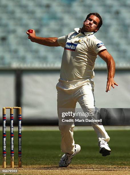 John Hastings of the Bushrangers bowls during day three of the Sheffield Shield match between the Victorian Bushrangers and the Queensland Bulls at...