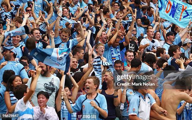 Sydney fans celebrate a goal during the round 27 A-League match between Sydney FC and the Melbourne Victory at Sydney Football Stadium on February...