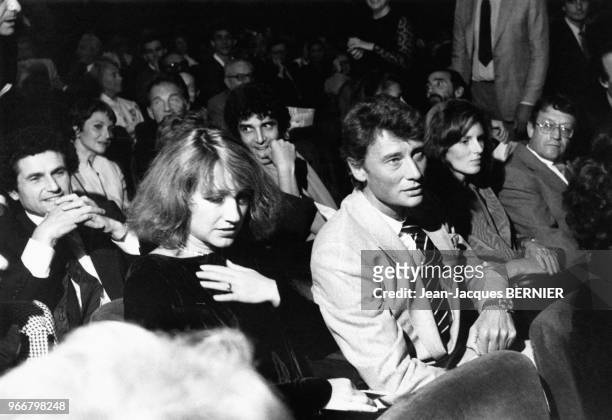 Actrice française Nathalie Baye et le chanteur Johnny Hallyday au spectacle d'Annie Girardot le 19 septembre 1983 à Paris, France.