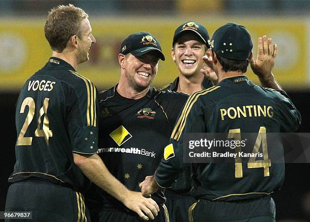 James Hopes of Australia celebrates with team mates after running out Wavell Hinds of the West Indies during the Fourth One Day International match...