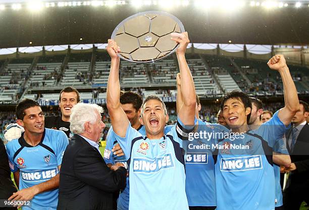 Steve Corica of Sydney celebrates with the minor premiership trophy after the round 27 A-League match between Sydney FC and the Melbourne Victory at...