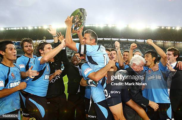Steve Corica of Sydney celebrates with the minor premiership trophy after the round 27 A-League match between Sydney FC and the Melbourne Victory at...