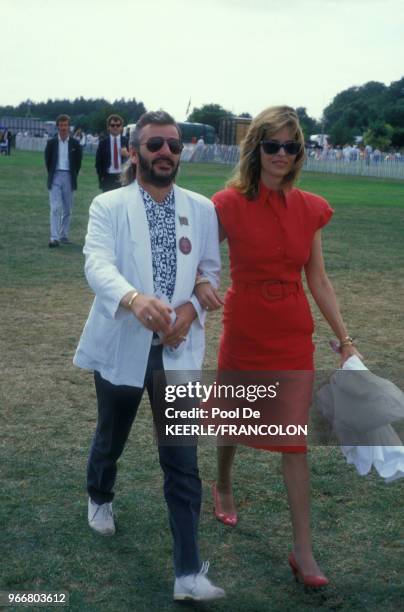 Ringo Starr et sa femme Barbara Bach lors du trophée de Polo Cartier le 27 juillet 1986 à Windsor, Royaume-Uni.