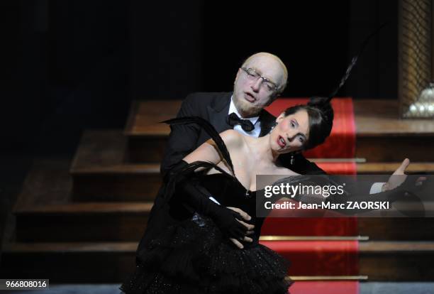 Brigitte Hool and Laurent Naouri in Parisian Life, an operetta in four acts, composed by Jacques Offenbach, with a libretto by Henri Meilhac and...