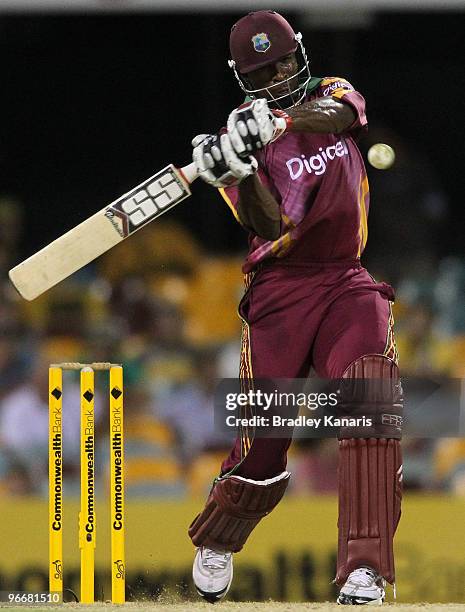 Kieron Pollard of the West Indies hits the ball to the boundary for four runs during the Fourth One Day International match between Australia and the...