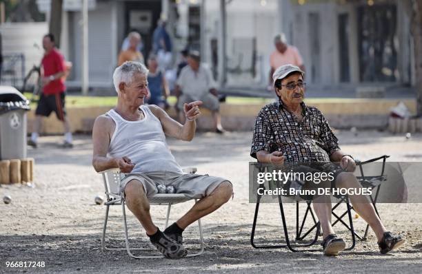 People in holidays at the seaside playing lawn bowling on August 15, 2009 in Balaruc les Bains, France.