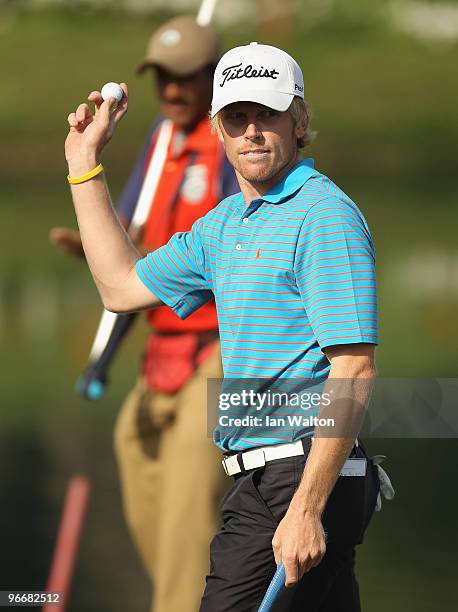 Andrew Dodt of Australia celebrates a put on the 18th green during the Final Round of the Avantha Masters held at The DLF Golf and Country Club on...