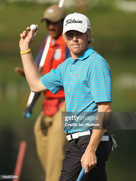 Andrew Dodt of Australia celebrates a put on the 18th green during the Final Round of the Avantha Masters held at The DLF Golf and Country Club on...