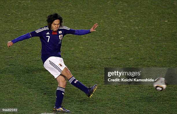 Yasuhito Endo of Japan scores a goal during the East Asian Football Championship 2010 match between Japan and South Korea at the National Stadium on...