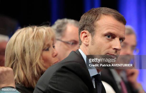 Brigitte Macron with President of the political movement 'En Marche !' and French presidential election candidate Emmanuel Macron delivers a speech...